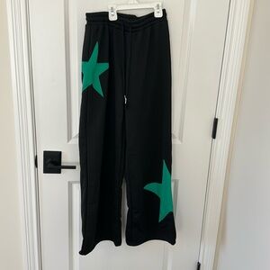 Shein xs wide leg sweatpants. Black with green stars. Never worn.